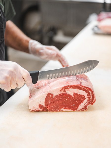 The Melting Place cutting raw meat